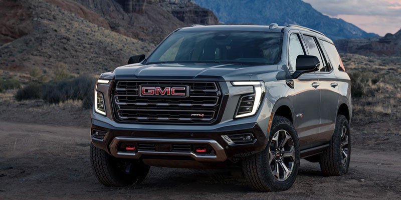 2026 GMC Yukon front three-quarter view highlighting available trim design